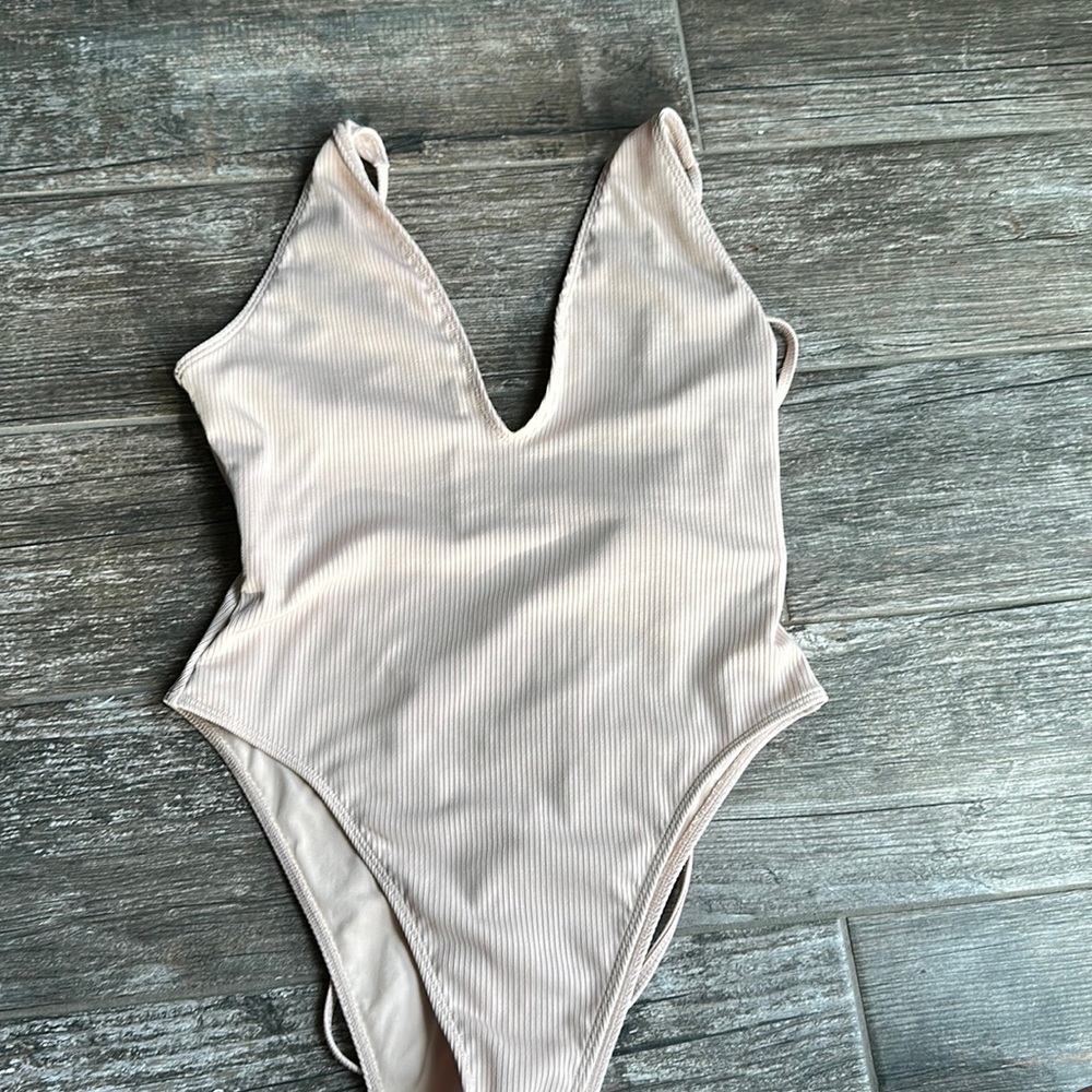Tan color swimming suit